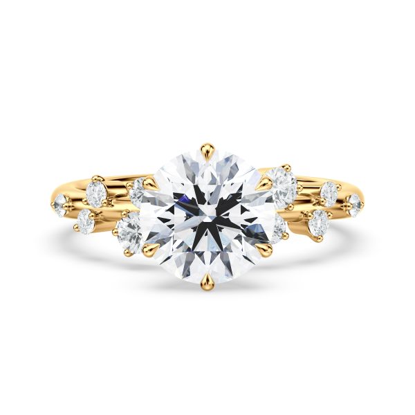 18k yellow gold snow drift engagement ring with round shape diamond